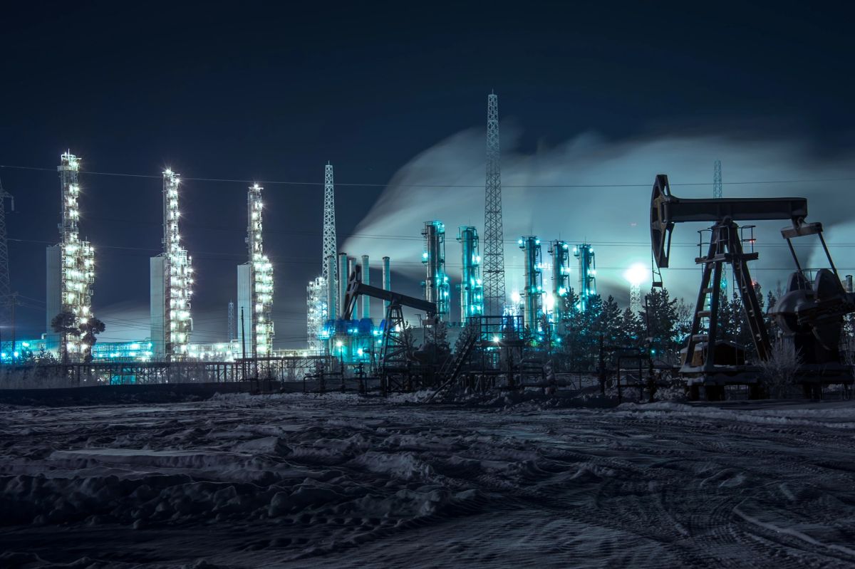 Oil and gas field at night